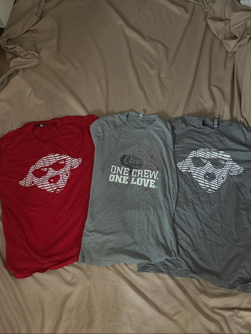 official raising Cane‘s unisex Cane‘s crew shirts.